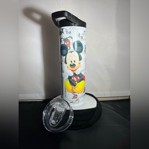 20oz double walled stainless steel tumbler with 2 lids and a straw.